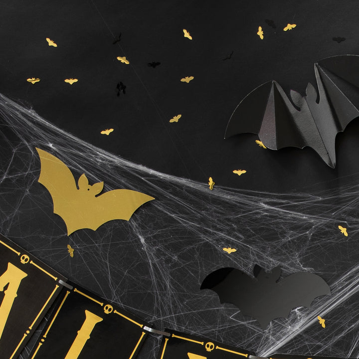 Zdjęcie aranżacyjne na Halloween z nietoperzami