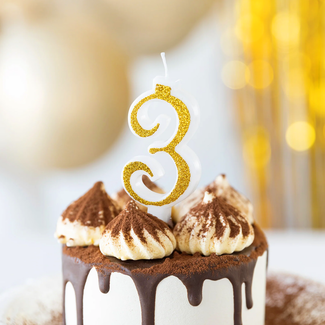 Small gold candle with glitter, number 3