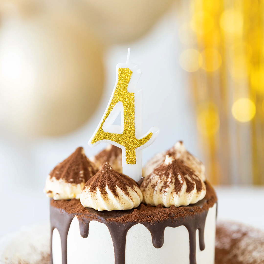 Small gold candle with glitter, number 4