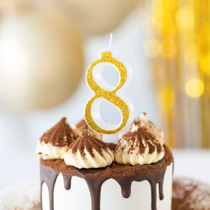 Small gold candle with glitter, number 8