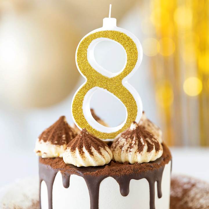 Large gold candle with glitter, number 8