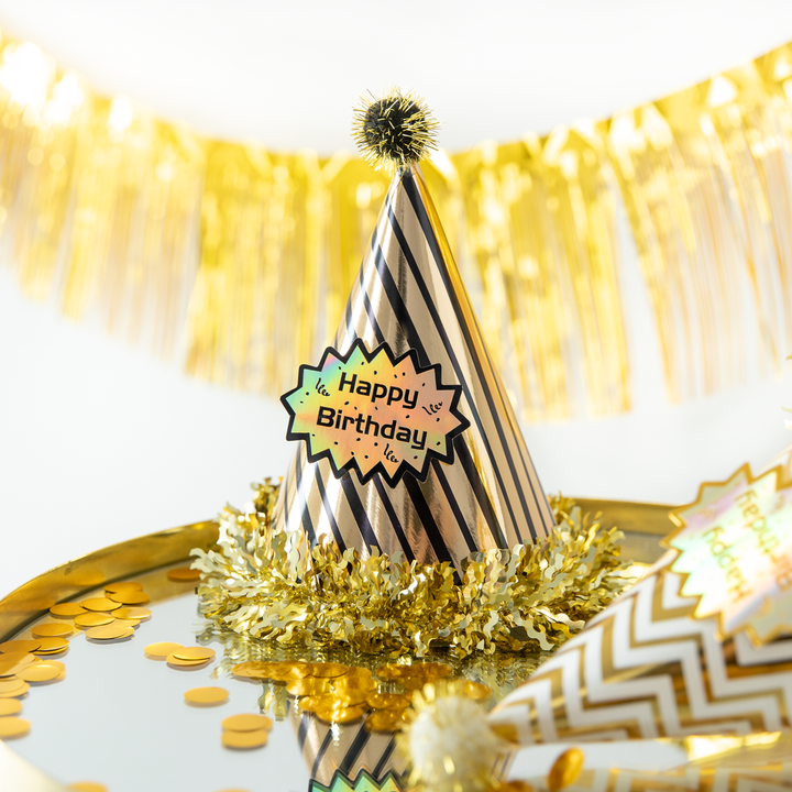 Czapeczka urodzinowa z pomponem Happy Birthday w paski czarno-złota 1 szt.