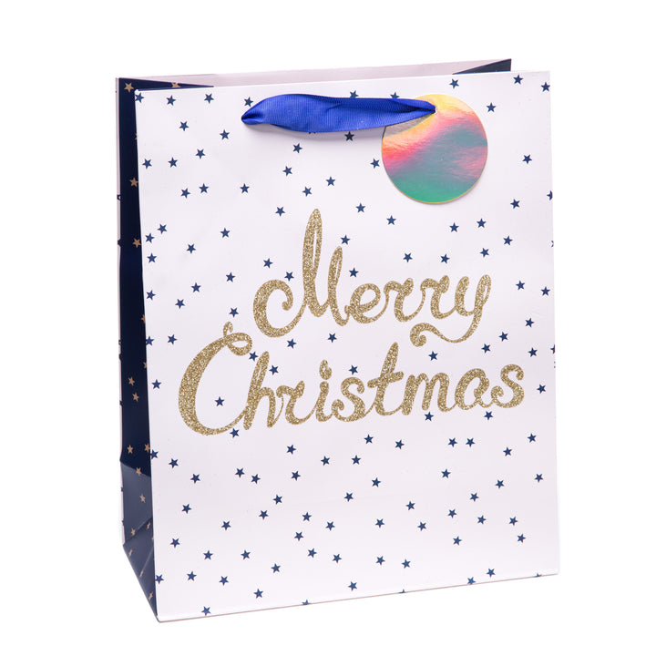 Torebka na prezenty granatowo-biała ze małymi złotymi i granatowymi gwiazdkami i ze złotym napisem Merry Christmas
